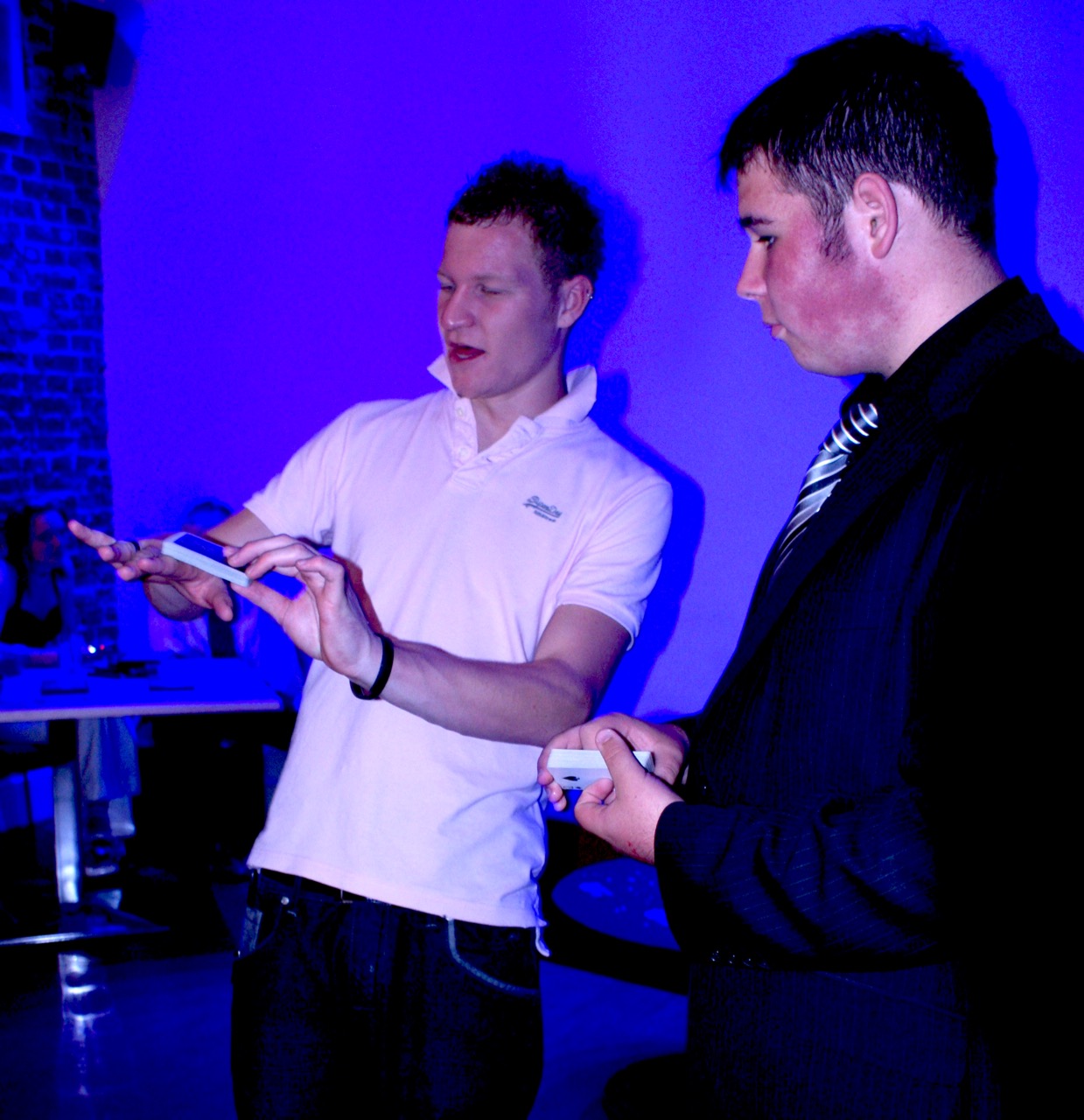 Street Magician Liam Walsh performing close up magic at DVD Launch Party in Brighton